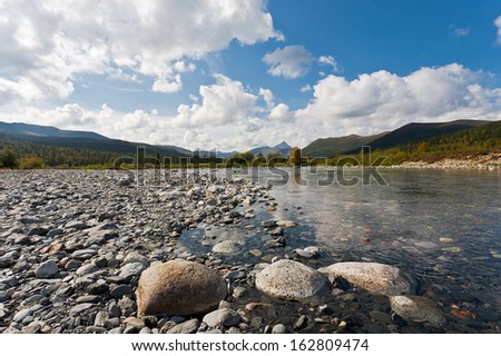 Mountain landscape with pond, Ural Mountains, Russia.