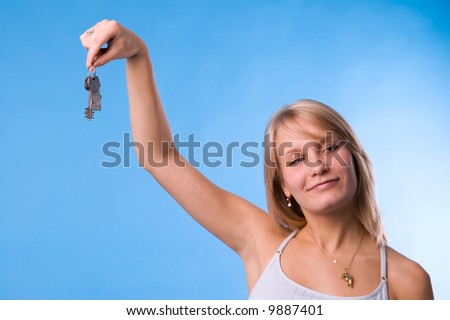 The girl gives someone keys