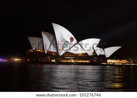 SYDNEY, AUSTRALIA - JUNE 11, 2012:  The Sydney Opera House becomes illuminated with spectacular motion picture art  during the annual Vivid Sydney Festival June 11, 2012