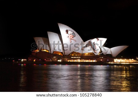 SYDNEY, AUSTRALIA - JUNE 11, 2012:  The Sydney Opera House becomes illuminated with spectacular motion picture art  during the annual Vivid Sydney Festival on June 11, 2012
