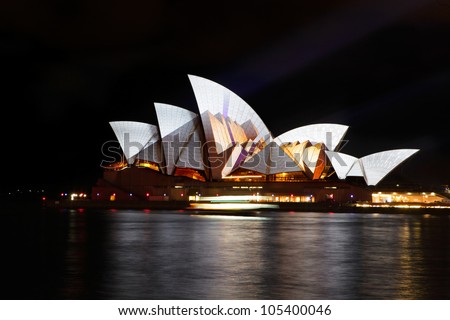 SYDNEY, AUSTRALIA - JUNE 11, 2012:  The Sydney Opera House becomes illuminated with spectacular art by various artists during the annual Vivid Sydney Festival on June 11, 2012