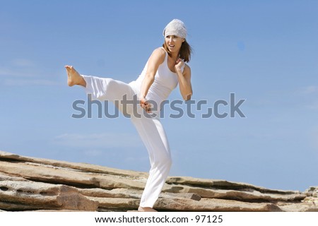 Large high karate kick.  \
\
Great aerobic, cardio workout and self defense.