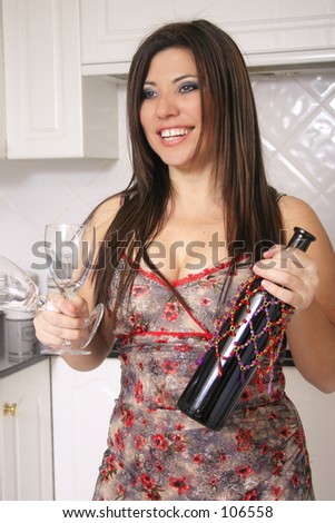 Happy woman with wine and glasses