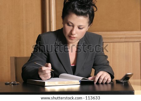 Office hours - busy woman in office