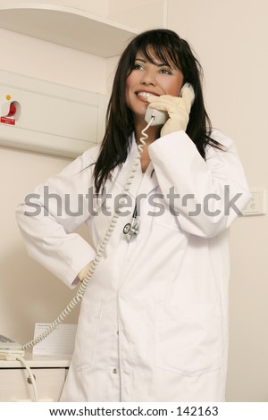 Medical staffer on duty takes a phone call