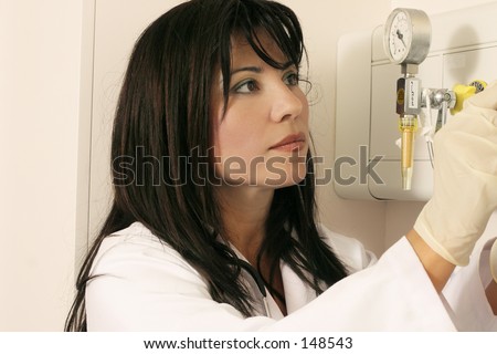Woman using medical equipment