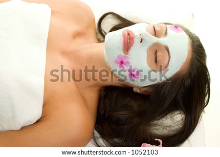 A woman with a botanical mask with rehydrating ceramide serum and vegetarian collagen.  Ultra moisturising for sensitive skin