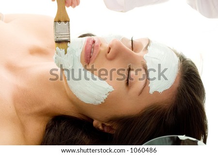 A mask is applied at a beauty salon