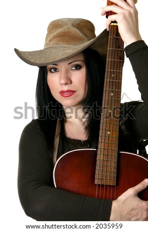 Country woman holding an acoustic guitar