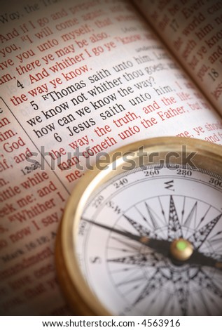 Compass and bible depicting popular bible verse John 14:5-6  How do we know the way.  I am the way the truth and the life....etc.   Focus to bible text