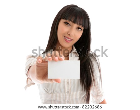 Confident smiling young beautiful woman holding out a business card, club card or any other type of card. eg: bank card, student card, place card.