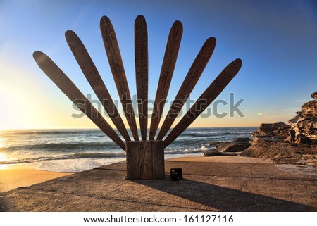 BONDI - TAMARAMA, AUSTRALIA - November 3,  2013: Sculpture By The Sea, Bondi 2013.  Sculpture titled \'A tale of romance\' by Kathy Howlowko (VIC).  Medium reclaimed timber.  Price $6500