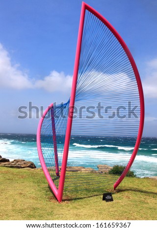 BONDI BEACH, AUSTRALIA - OCTOBER 29, 2013: Sculpture By The Sea, Bondi.  Sculpture titled \'Inclusion\' by Greer Taylor (NSW).  Medium aluminium, cable, paint, nickel plated brass.