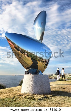 BONDI, AUSTRALIA - NOVEMBER 3,  2013: Sculpture By The Sea, 2013.   Sculpture titled \'Life Reflection xx\' by Byung-Chul Ahn (South Korea).  Medium - stainless steel, granite