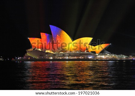 SYDNEY NSW, AUSTRALIA - JUNE 2, 2014;  Projections of vibrant moving colour on Sydney Opera House sails during Vivid Sydney annual festival event.