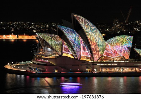 SYDNEY, NSW, AUSTRALIA - JUNE 6, 2014;  Iconic Sydney Opera House in vibrant reptile snakeskin print during Vivid Sydney annual festival event.