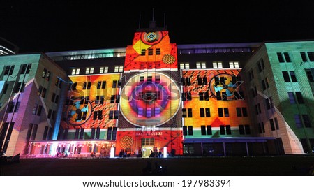 SYDNEY, NSW, AUSTRALIA - JUNE 2, 2014; Museum of Contemporary Art comes alive with projections of moving imagery and music  during Vivid Sydney festival event for locals and tourists to enjoy.