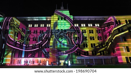 SYDNEY, NSW, AUSTRALIA - JUNE 2, 2014; Museum of Contemporary Art comes alive with projections of moving imagery and music  during Vivid Sydney festival event for locals and tourists to enjoy.