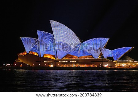 SYDNEY, AUSTRALIA - JUNE 2, 2014;  Sydney Opera House with architectural blueprint design during Vivid Sydney annual festival of light, music and ideas