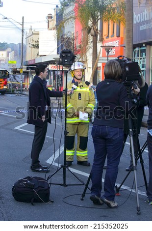 ROZELLE, AUSTRALIA - SEPTEMBER 4, 2014; Superintendent Paul Johnstone of Fire and Rescue updating media on fire and explosion at convenience store in Rozelle, Sydney where three people perished.