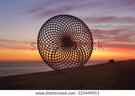 BONDI, AUSTRALIA - 23 OCTOBER, 2014; Sculpture by the Sea Annual Event 2014.  Sculpture titled Sisyphus by George Andric, SA.  Materials, stainless steel.  Price $36000
