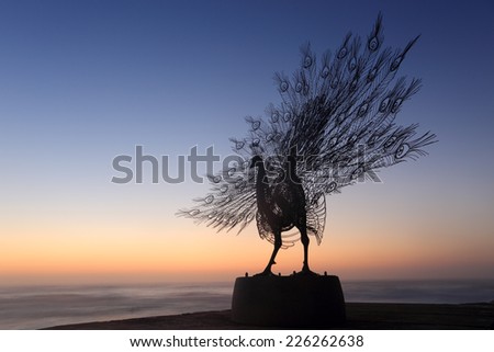 BONDI, AUSTRALIA -  OCTOBER 25, 2014; Sculpture by the Sea annual public event 2014.  Sculpture titled Our Memory in Your Place by Byeong Doo Moon, South Korea.  Materials, stainless steel, granite