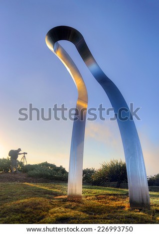 BONDI, AUSTRALIA - OCTOBER 25, 2014; Sculpture by the Sea Annual free public event 2014.  Exhibit titled Transfiguration Raise III   by artist MitsuoTakeuchi, Japan,