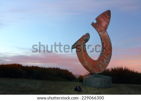 BONDI, AUSTRALIA - OCTOBER 27, 2014; Sculpture by the Sea Annual event 2014.  Exhibit titled The Moment by artist Ron Gomboc, WA,  The first glance that bonds mother to child.   Materials, copper