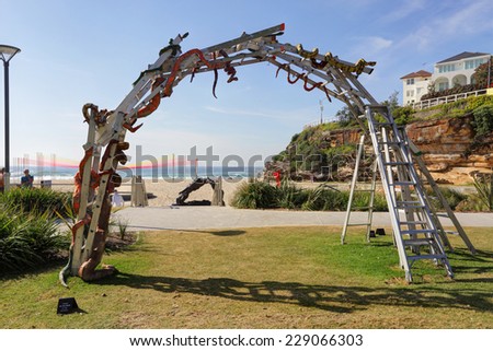 BONDI, AUSTRALIA - OCTOBER 30, 2014; Sculpture by the Sea Annual free public event 2014.  Exhibit titled Snakes and Ladders  by artist Hannah Kidd, NZ on Tamarama Beach.