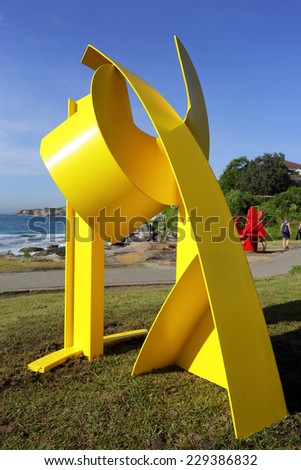 BONDI, AUSTRALIA - OCTOBER 23, 2014; Sculpture by the Sea Annual free public event 2014.  Exhibit titled Clutch  by artist Noah Birch,  WA.  An improvised abstract composition made of painted steel.