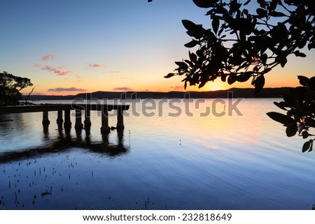 A beautiful sunset at Green Point jetty on the Central Coast, NSW, Australia.