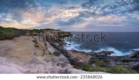 Scenic views north at Cape Solander.  Sydney Australia.  You would not want to have been standing on the cliff ledges when it gave way and crumbled onto the lower rock shelf and ocean