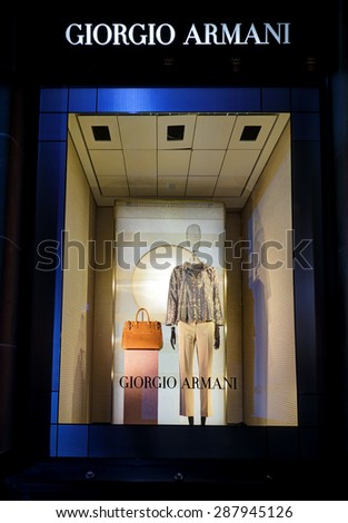 SYDNEY, AUSTRALIA, MAY 26, 2015;  One of the retail shop window displays in Martin Place, a mannequin wearing womens clothing and accessories - visual merchandising of Giorgio Armani, Sydney