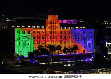 SYDNEY, AUSTRALIA - JUNE 2, 2015;  Vivid lights up the Museum of Contemporary Art Building in a variety of ever changing colours and patterns.  Elevated view