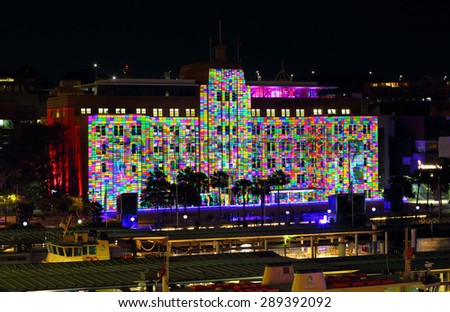 SYDNEY, AUSTRALIA - JUNE 3, 2013;  Museum of Contemporary Art Building alive with colour and light during Vivid Sydney.    Multicolour rainbow blocks like a rubics cube