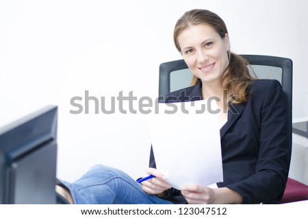 A relaxed business woman at her office
