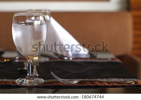 fresh water in the grass on the dining table