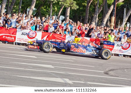 AZERBAIJAN, BAKU - JUNE 17: David Coulthard drive the RB7 of Red Bull Racing Team, Red Bull Showrun Parade, June 17, 2012 in Baku, Azerbaijan