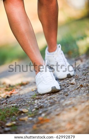 Woman walking trail