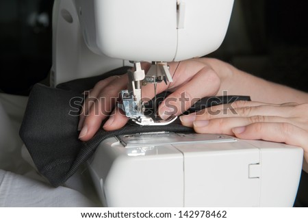 sewing machine and black fabric