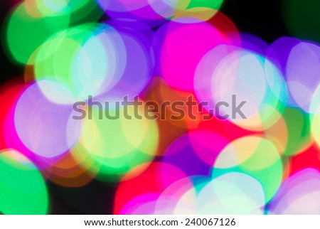 Festive xmas abstract background with bokeh defocused lights and stars. Boke twinkling Lights Festive holiday party background with blurry special magic effect.