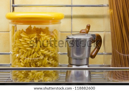 Jars of Pasta and a Mini-Coffee Maker in the Kitchen