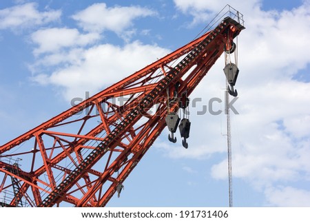 Red Crane Arm against the Sky