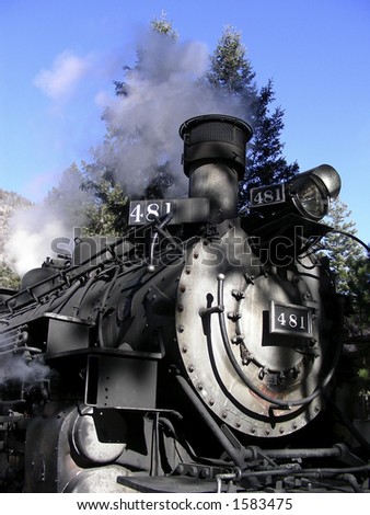 Antique narrow gauge steam engine train in the Colorado Rockies