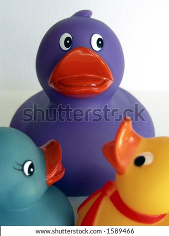 Mother rubber ducky instructing her children