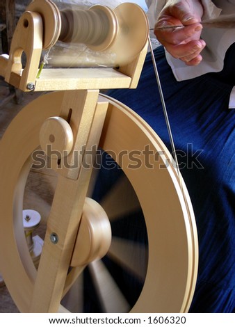 Old time method of spinning wool into yarn