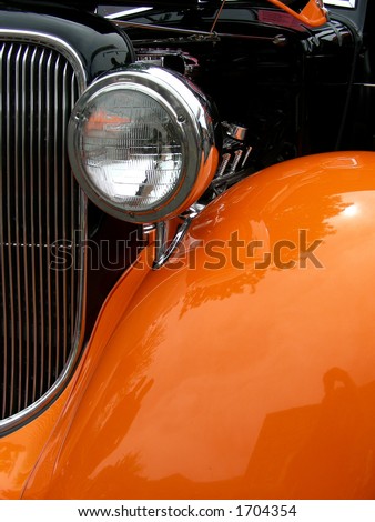 Head lamp, grill and fender on antique 1934 automobile