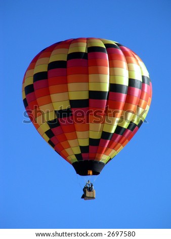 Hot air balloon being fired, increasing in altitude