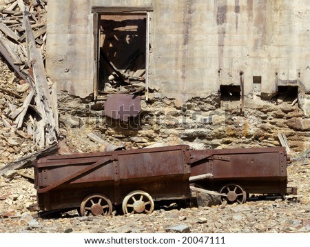 Narrow gauge miner cart abandoned near silver mine ruins in the Colorado Rockies