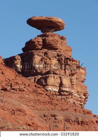 Red stone rock balanced precariously near Mexican Hat, Utah